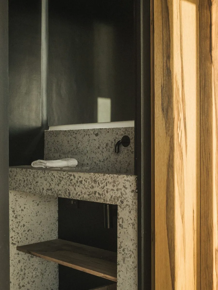 The bathroom, concrete and terrazzo